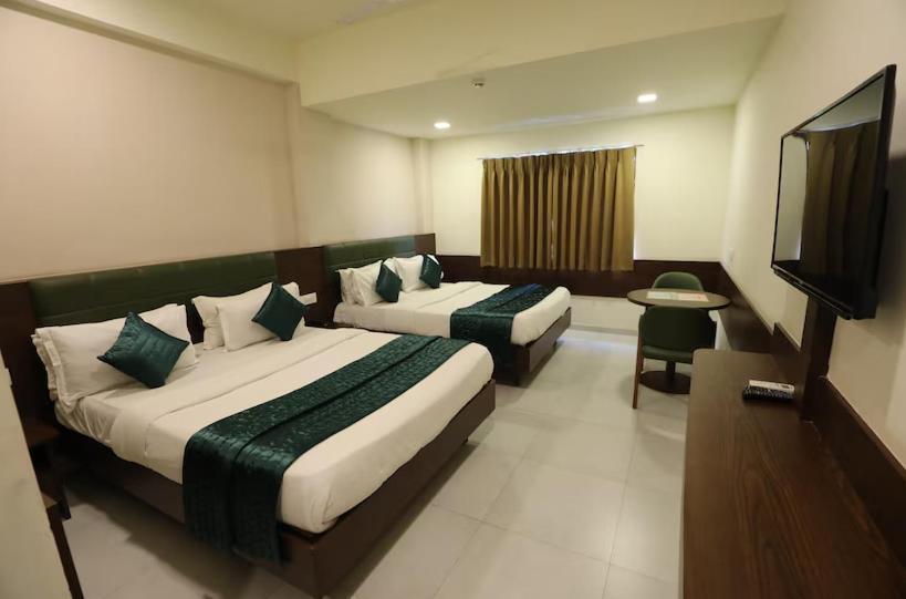 Greenotel Rooms Hazira, Сурат Экстерьер фото